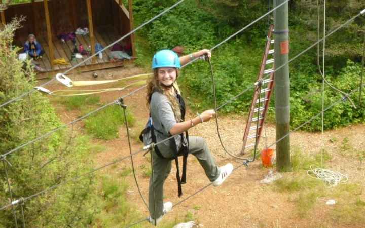 girls build confidence on ropes course